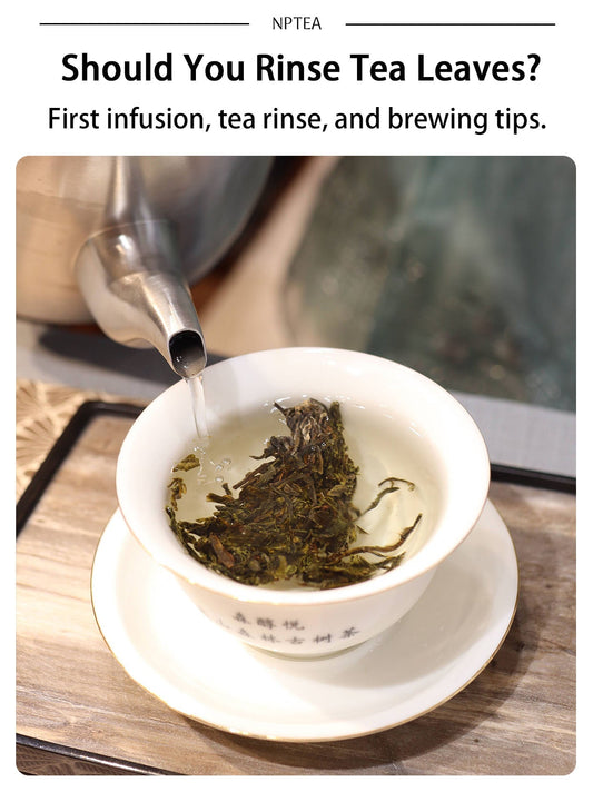 Hot water rinsing loose leaf tea in a gaiwan before brewing