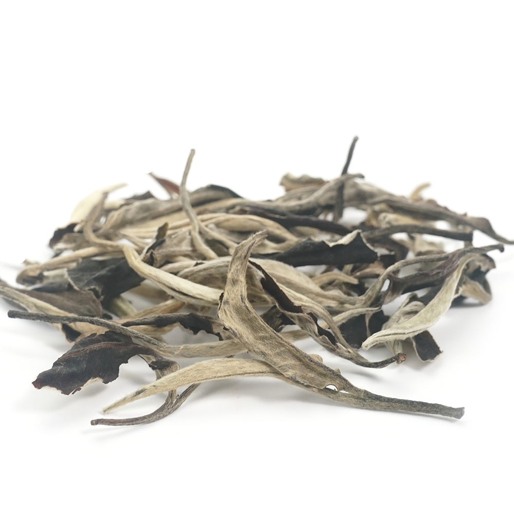 2024 Sweet Plum-Scented Yue Guang Bai dry leaves featuring a striking black and silver-white contrast.