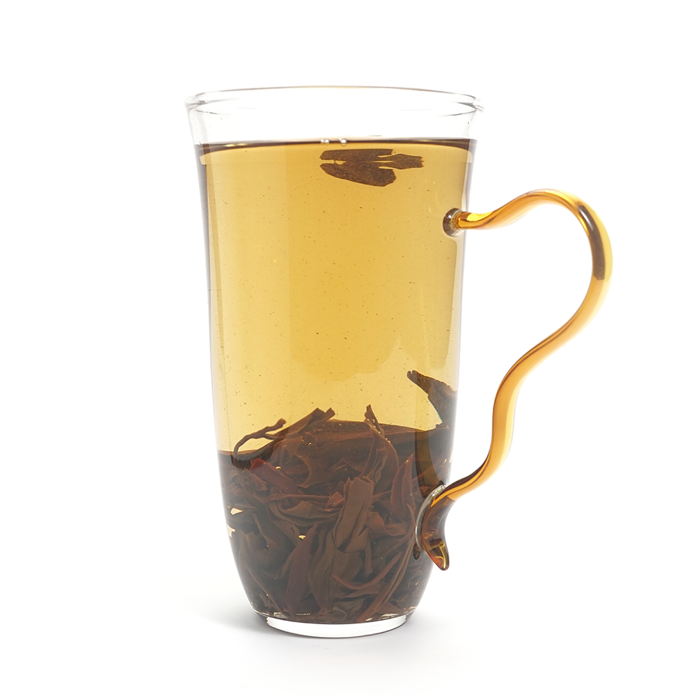 Fruity Dianhong Black Tea (Black Beauty) liquor with a bright, clear amber-gold color.