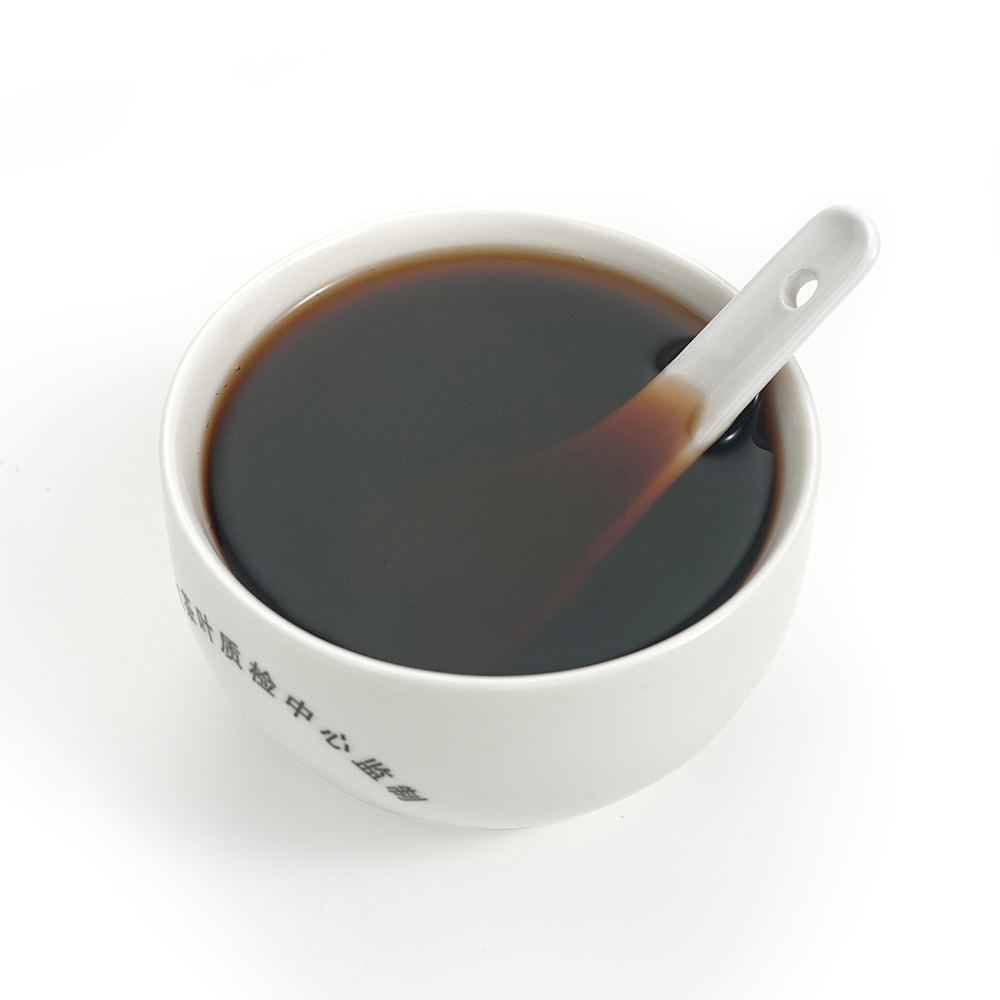 2020 Xiao Hu Sai ripe Pu’er tea liquor, thick dark smooth shu Pu’er infusion
