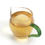 2023 Elegant Floral Raw Pu’er Tea Cake (Xiao Huang Tian) - 200g brews into bright golden-yellow liquor with high clarity