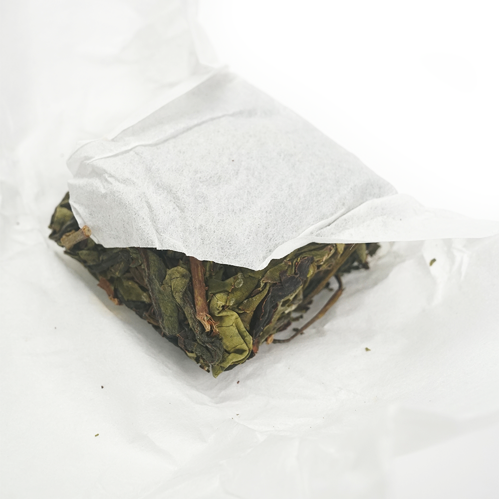 Hand-pressed Orchid Fragrant oolong tea cake from Fujian China