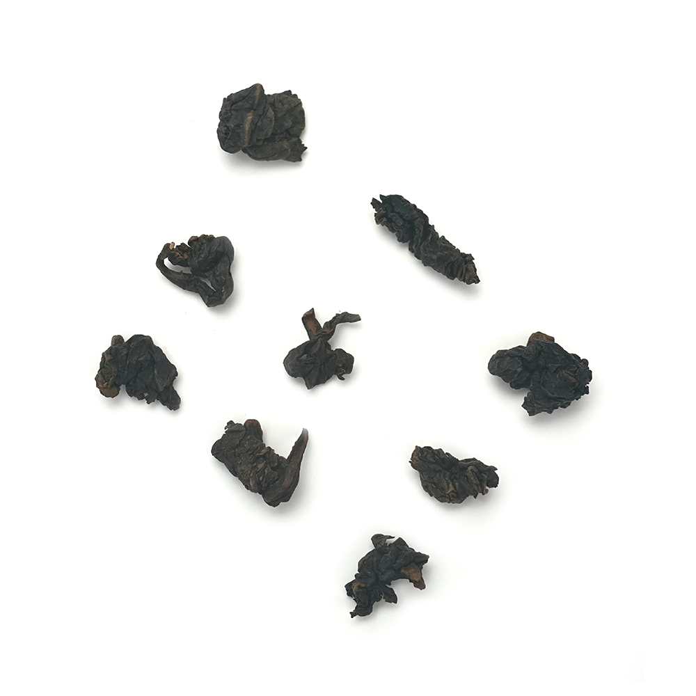 Traditional Iron Goddess oolong tea dark glossy pellets