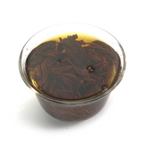Clear aromatic black tea liquor China Dianhong Black Beauty