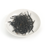 Artisan Chinese Black Tea (China Red) dry tea strips with intense natural floral fragrance.