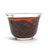 Clear and aromatic black tea liquor China Red in glass cup