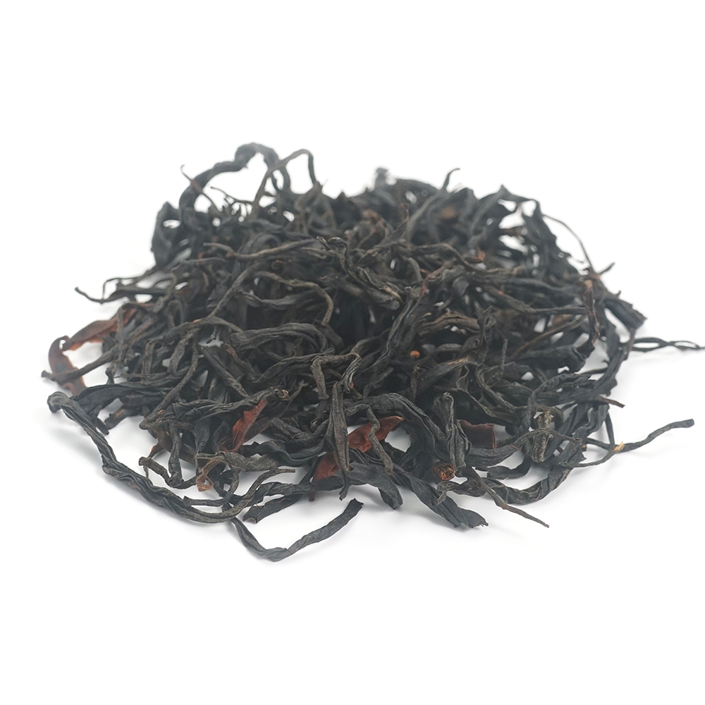 Fruity Dianhong Black Tea (Black Beauty) dry leaves with prominent golden tips and dark luster.