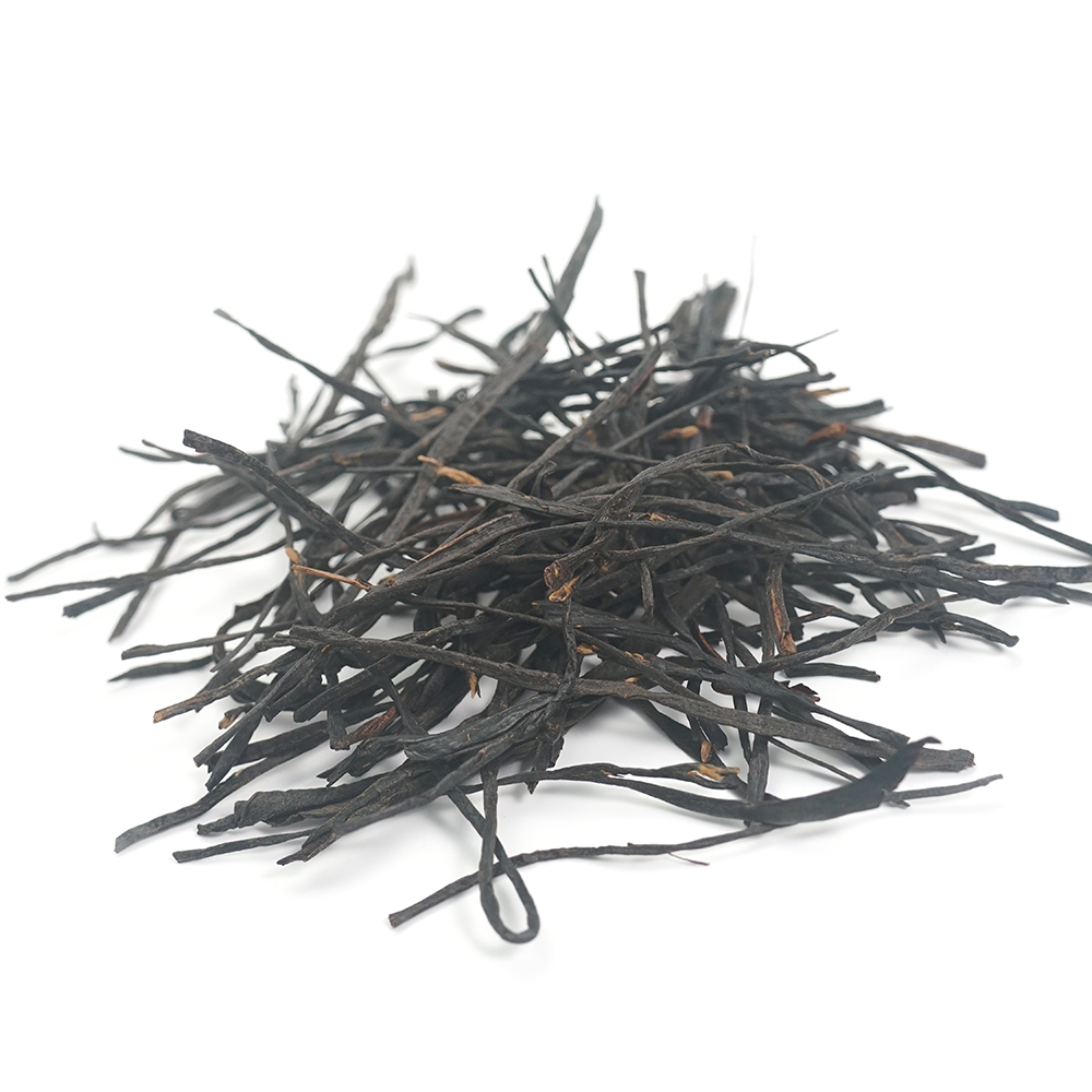 Tightly twisted dry leaves of Aromatic Black Tea (China Red) with subtle golden tips.