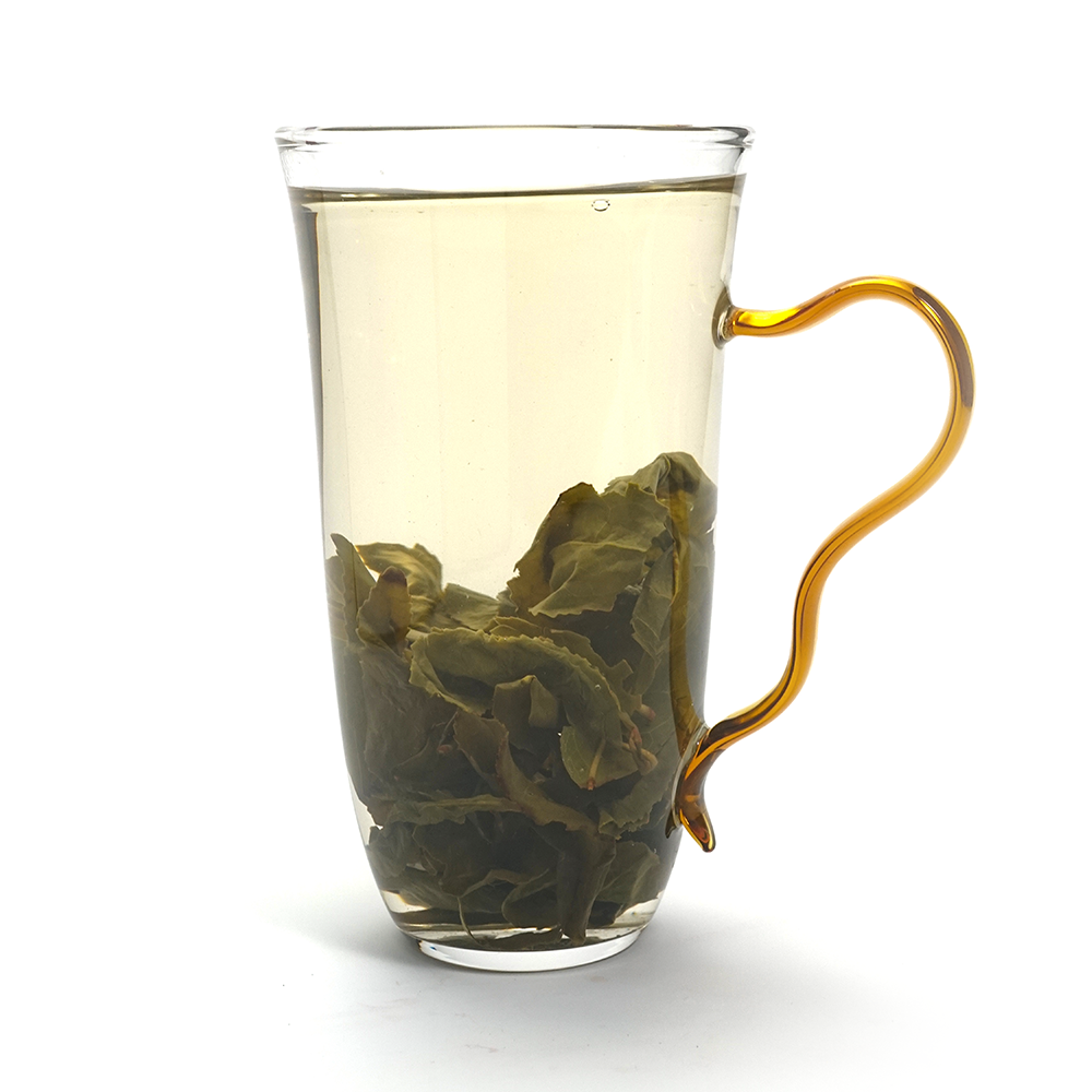 Bright yellow-green tea soup of Light-Roasted Iron Goddess