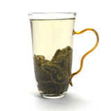 Bright yellow-green tea soup of Light-Roasted Iron Goddess
